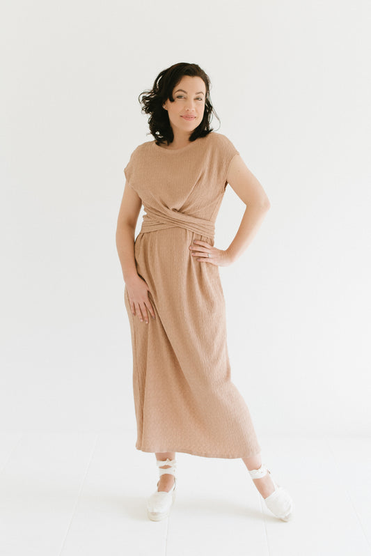The Anneen Henze Everyday Dress is one of our favourite items this season. Designed with a simplistic, comfortable stretch and fit for any season, this dress is an absolute staple piece. She fits easy and wears beautifully with versatility for styling with a front or back tie detail. Featuring a crew neckline and front cross-over detail.